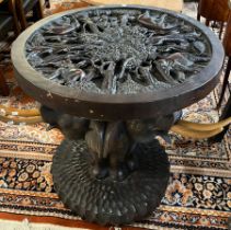20th century carved hardwood probably Indian Elephant table, the carved and glass top above Elephant