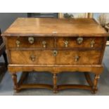 Queen Anne style walnut chest of drawers, the moulded top above two cock beaded drawers with brass