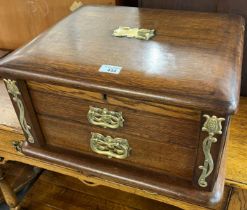 Art Nouveau oak cutlery box with brass organic design mounts, the interior revealing part silver