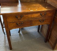 19th century lowboy, the moulded top above one long and two short drawers, standing on chamfered