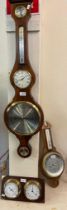 Reproduction mahogany wheel barometer by Comitti of London together with a modern German clock and