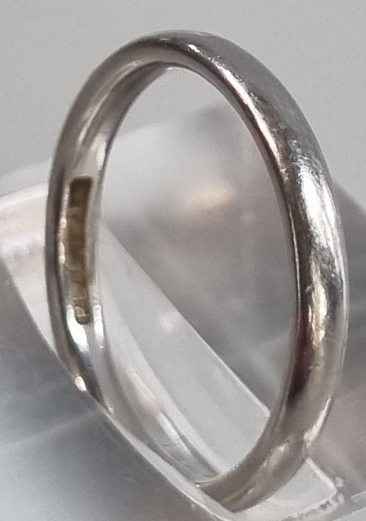 Platinum wedding band. 3.2g approx. Size J1/2. (B.P. 21% + VAT) - Image 2 of 4