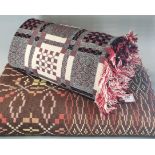 Two vintage woollen Welsh tapestry blankets with geometric designs and fringed edges. (2) (B.P.