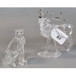 Two Swarovski Crystal animals to include: seated cheetah and stag, both in original boxes. (B.P. 21%