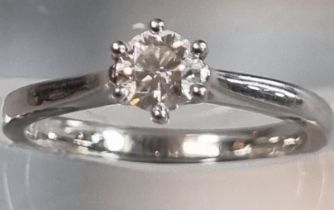 Modern platinum and diamond solitaire ring marked 'Pravins', in Pravins ring box. 3.5g approx.
