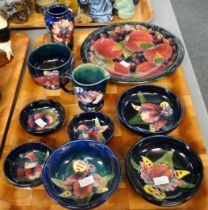 Tray of Moorcroft art pottery tube lined items to include: various Iris design trinket bowls,