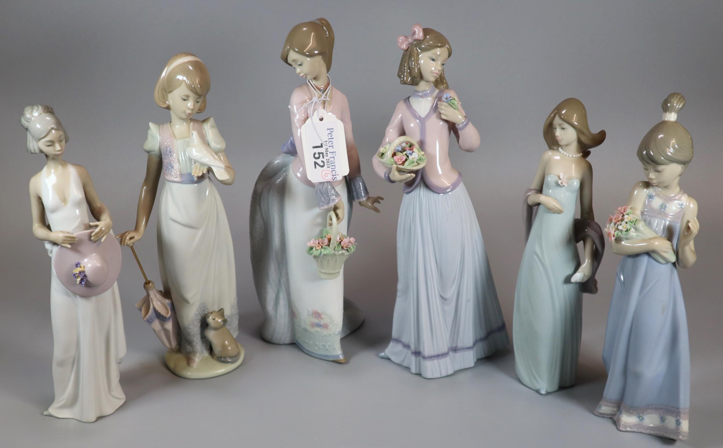 Collection of six Spanish porcelain Lladro figurines to include: girl with umbrella and dove,