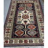 Vintage Afghan tribal design multi-coloured rug. 190x120cm approx. (B.P. 21% + VAT)