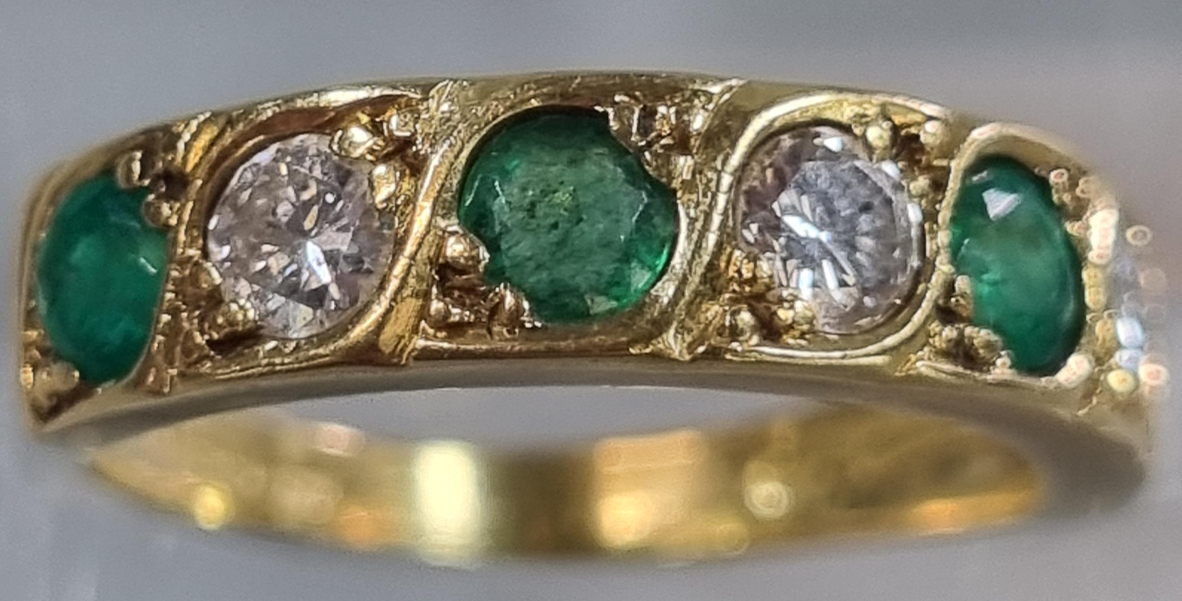18ct gold diamond and emerald seven stone ring. 3g approx. Size J. (B.P. 21% + VAT)