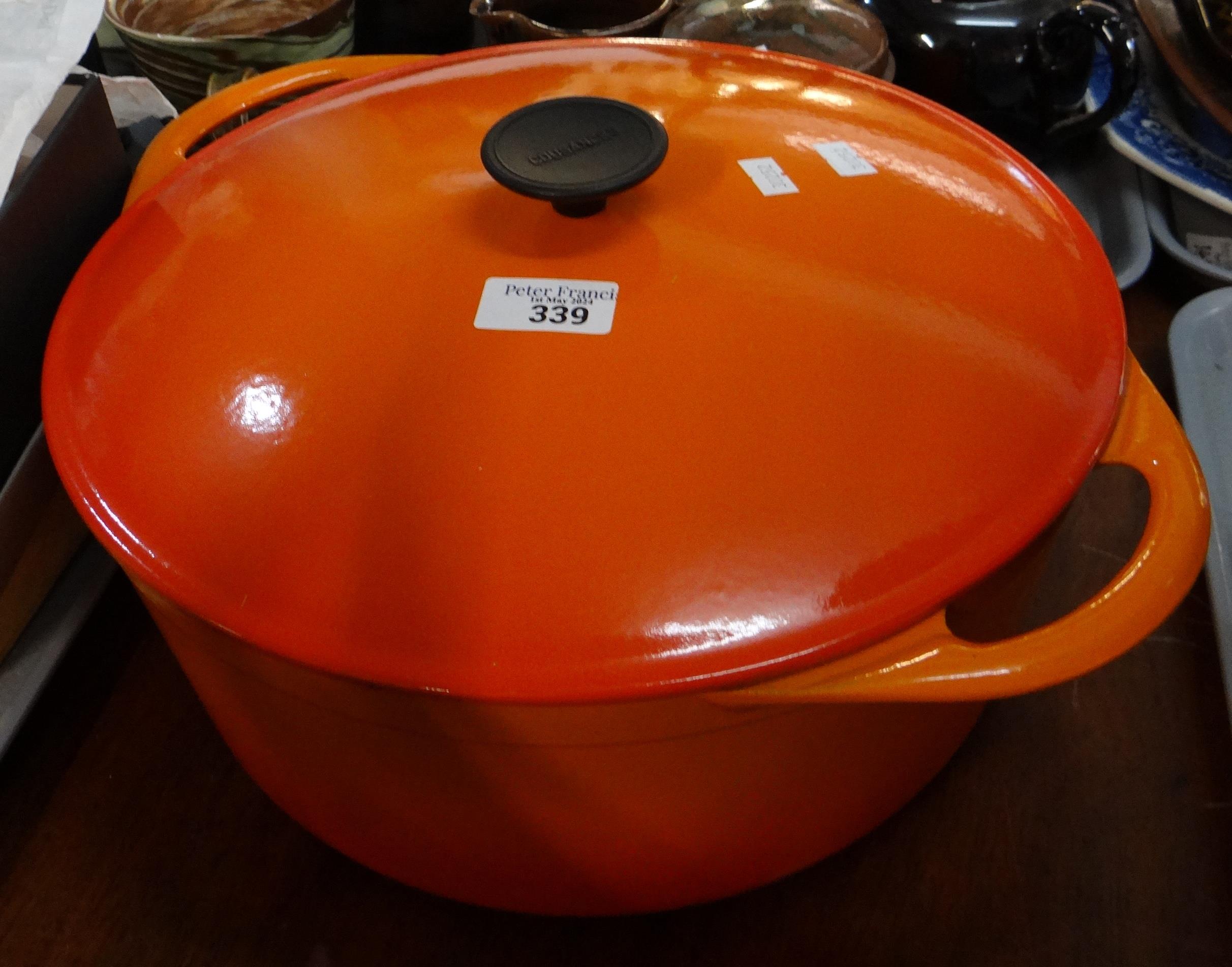 Cast metal orange casserole dish by Cousances. (B.P. 21% + VAT)