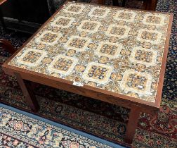 Mid century design, probably Danish, tile top coffee table of square form with repeating designs.