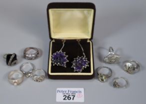 Box assorted silver dress rings together with a pair of silver mauve shell earrings. (B.P. 21% +