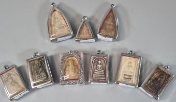 Collection of small framed Thai Buddha pendants. (9) (B.P. 21% + VAT)