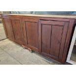 (See Lot 525) Large early 20th century stained pine four door office/library cupboard with fitted