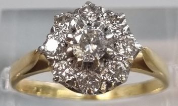 18ct gold diamond nine stone flowerhead cluster ring. 3.7g approx. Size M. (B.P. 21% + VAT) the