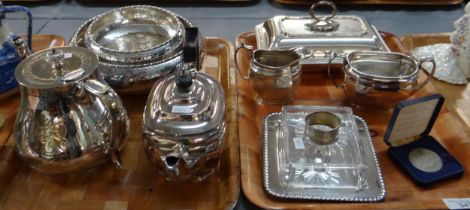 Two trays of silver plate to include: teapots, milk jug, sugar bowl, City of Belfast coin in case,