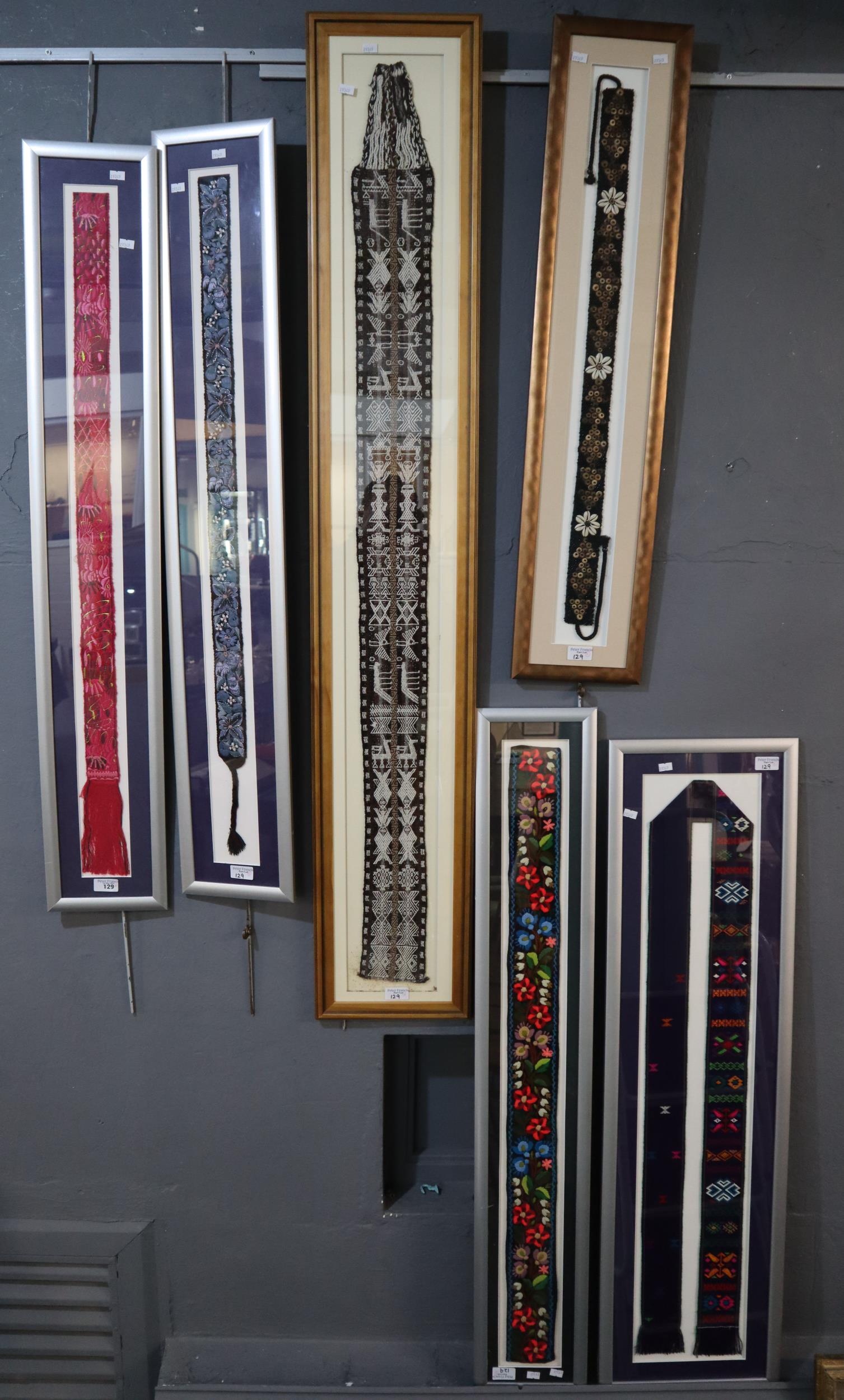 An interesting collection of woven, tapestry and needlework belts of various origins including: