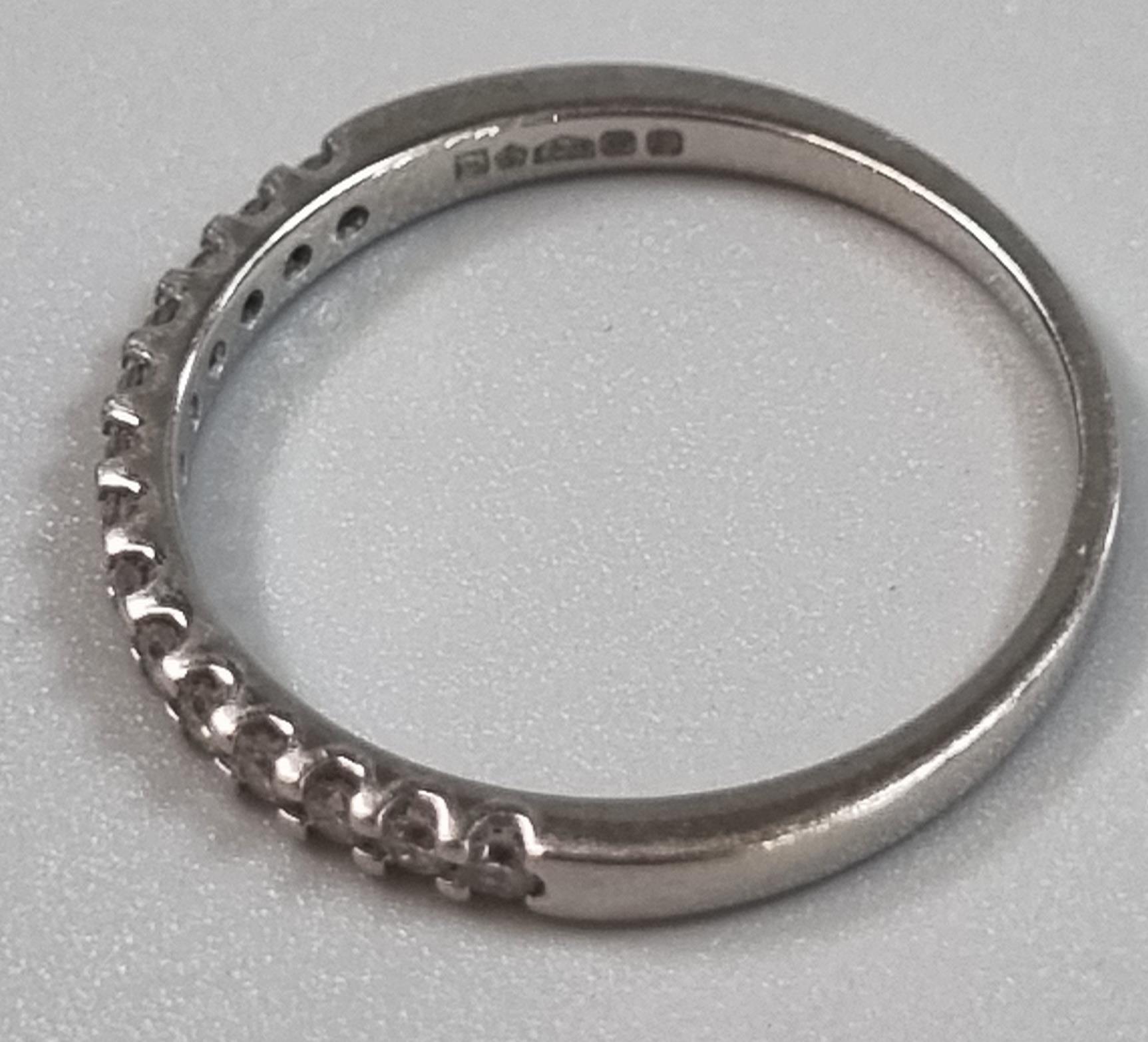Modern platinum and diamond half eternity ring marked 'Pravins', in Pravins ring box. 1.6g approx. - Image 3 of 4