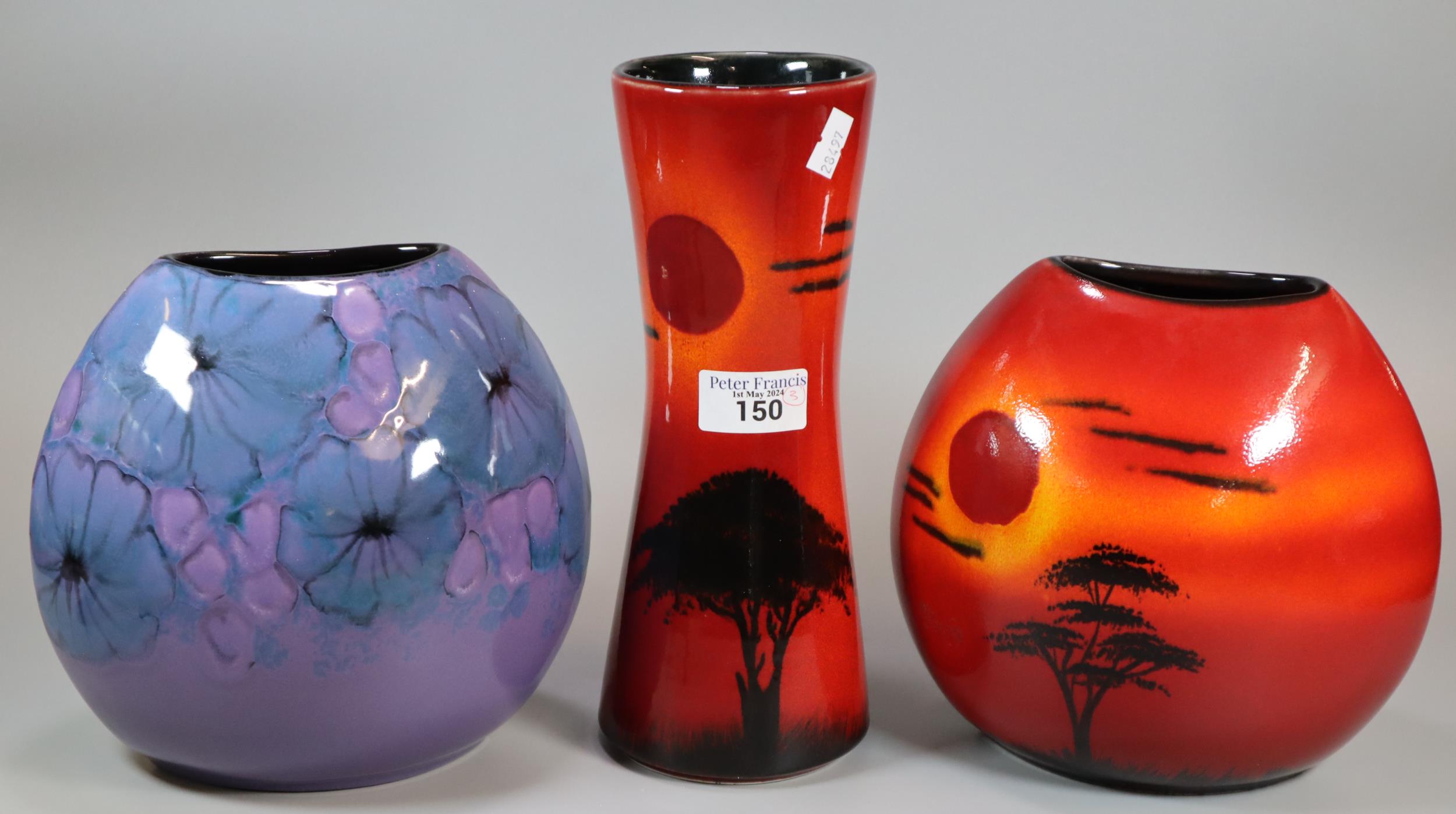 Two Poole pottery 'African sky' design vases in various shapes, one marked Andrew Tanner to the base