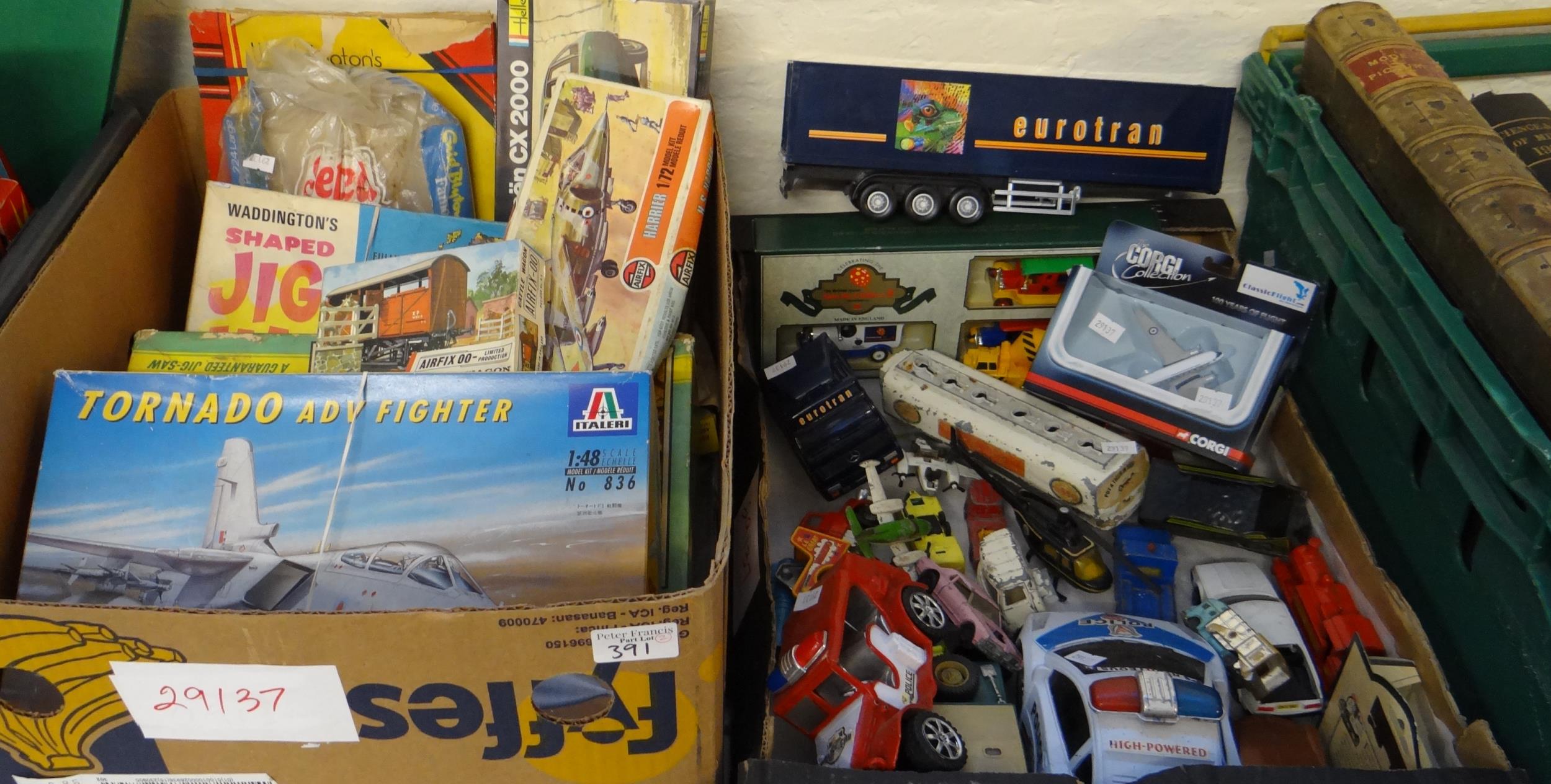 Two boxes of toys to include: Waddington's Jig Map, Airfix and similar model kits, diecast model