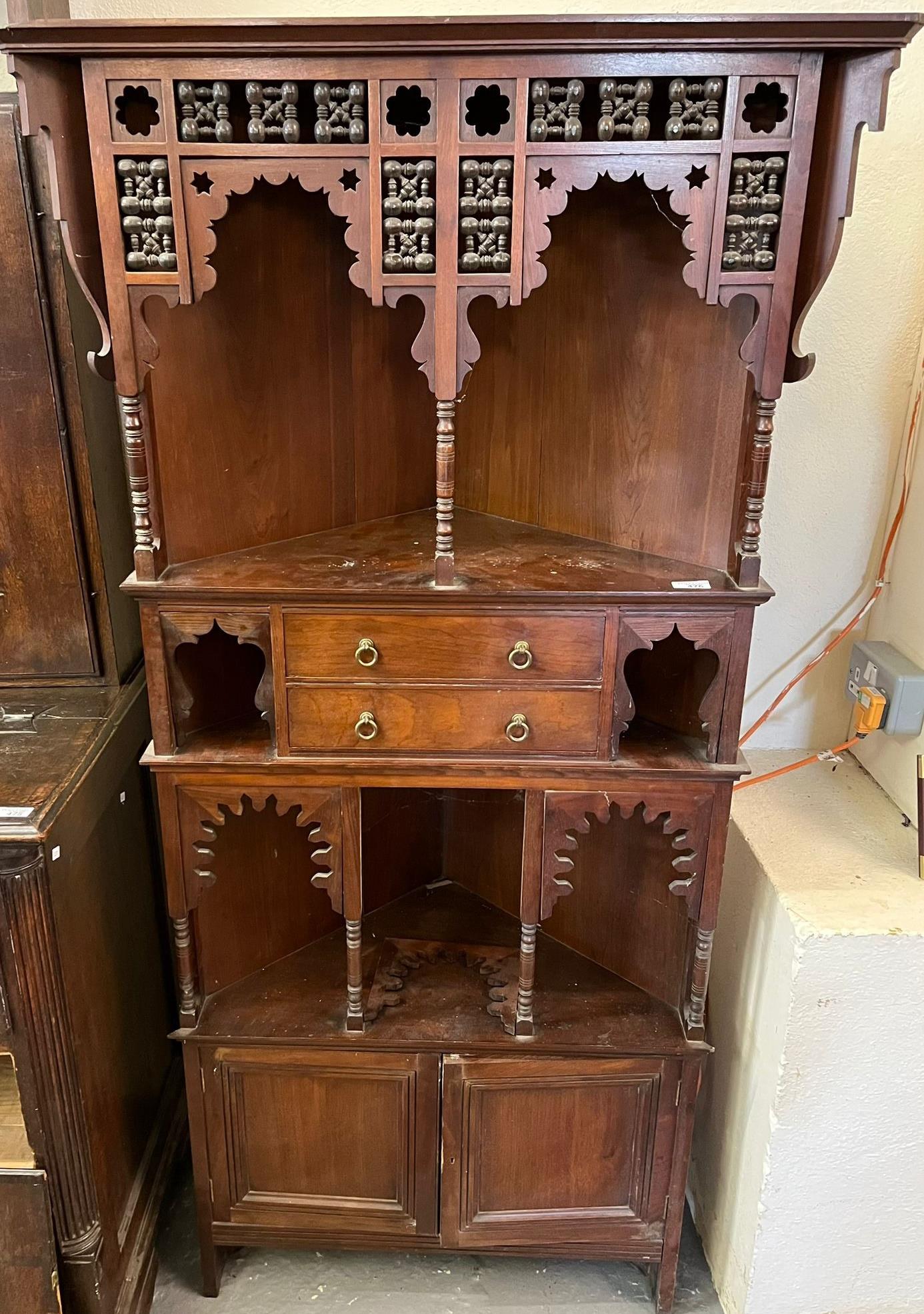 Early 20th century Moorish corner cabinet, probably by Liberty & Co. Possibly designed by Leonard