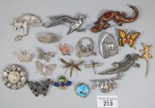 Collection of silver and other brooches: filigree designs of butterflies, dragonfly, other animals