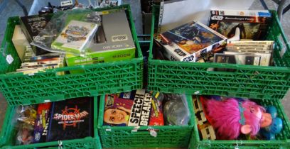 Four crates of toys, Star Wars memorabilia and games to include: Corgi Car transporters, Lego Star