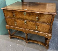 Queen Anne style walnut chest of drawers, the moulded top above two cock beaded drawers with brass