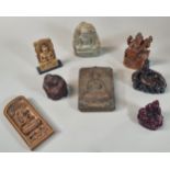 Collection of carved Buddha and other figurines, resin, stone and wood. (8) (B.P. 21% + VAT)