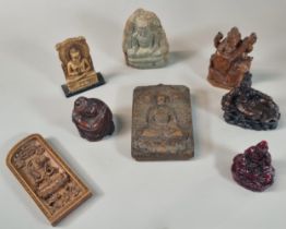 Collection of carved Buddha and other figurines, resin, stone and wood. (8) (B.P. 21% + VAT)