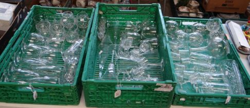 Three crates of glassware to include: champagne flutes, wine glasses, whisky tumblers, brandy