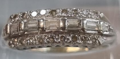 14K white gold diamond cluster ring of baguette and other form. 3.1g approx. Size M. (B.P. 21% +