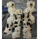 Tray of Beswick, Royal Doulton and Staffordshire seated fireside Spaniels. (B.P. 21% + VAT)