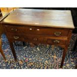 Early 19th century oak lowboy, the moulded top above an arrangement on three drawers with fan