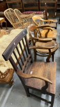 Early 19th century oak stick back farmhouse carver chair together with an early 20th century
