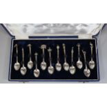 Set of South American (Argentinian) silver coffee spoons with various symbolic terminals. cased. (