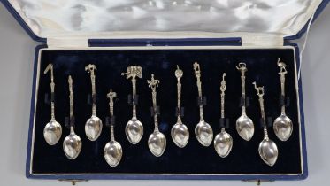 Set of South American (Argentinian) silver coffee spoons with various symbolic terminals. cased. (