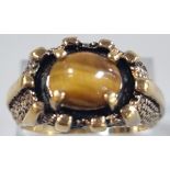 14K gold plated dress ring inset with Tiger's Eye stone. Size S. (B.P. 21% + VAT)