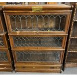 Early 20th century oak presentation Globe Wernicke lead glazed three sectional book case with