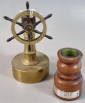 Brass model of a ship's wheel together with an oak dwarf baluster candlestick bearing label 'from