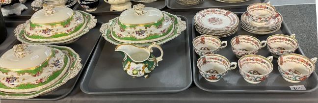 Set of three Ashworth's ironstone floral decorated green scaled and gilded tureens and covers,