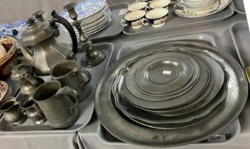 Collection of assorted pewter to include: various plates including large charger with foliate