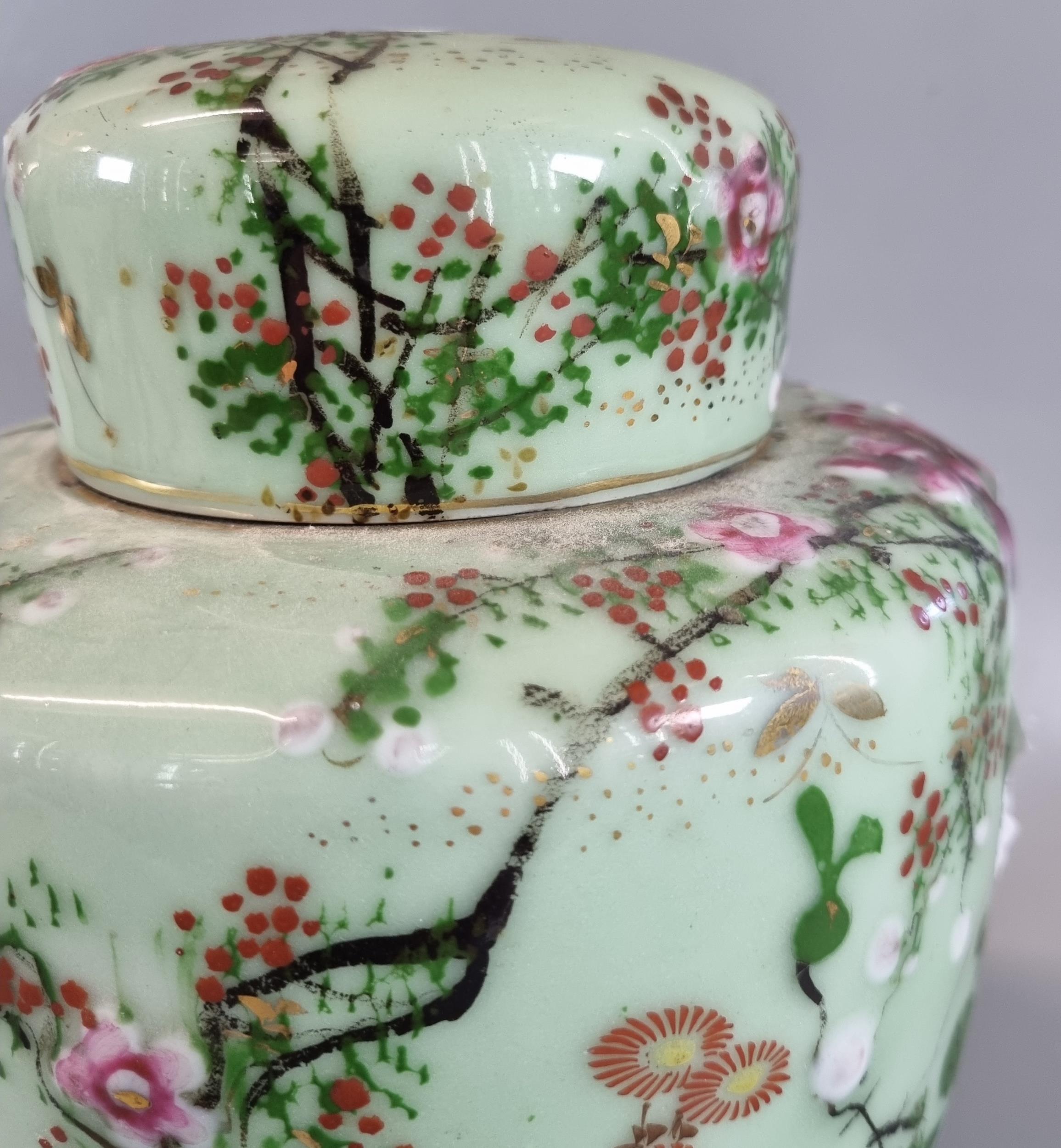 Japanese export, polychrome on celadon ground 'Seto' jar and cover, decorated with prunus flowers, - Image 2 of 2