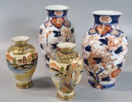Pair of Japanese Imari baluster vases depicting birds amongst flowers and foliage. 16cm high