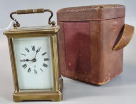 French brass carriage clock with full depth Roman ceramic face together with appearing original