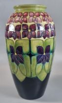 Modern Moorcroft Art Pottery tube-lined baluster vase, in the 'Violet' pattern. Impressed and