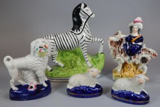 Collection of Staffordshire and Staffordshire style figures to include: recumbent sheep. zebra, goat