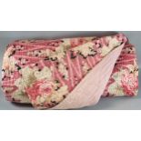 Pink ground bedspread/quilt decorated with roses. (B.P. 21% + VAT)