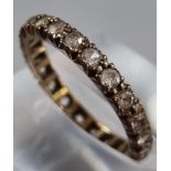 9ct gold full eternity style ring with white paste stones. 1.8g approx. Size M1/2. (B.P. 21% + VAT)