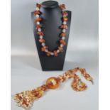 Carnelian and quartz necklace together with other carnelian and crystal jewellery to include